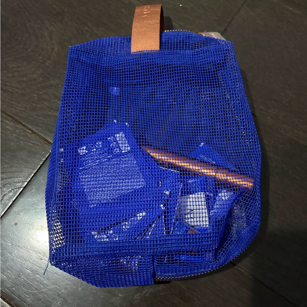 AB Augustine’s Bader bag with travel size products